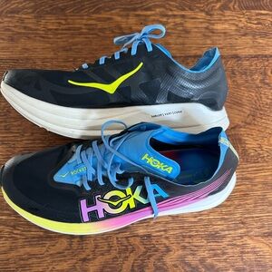 Hoka Clifton 8 and Rocket 5 running shoes in black and purple #running #trainers
